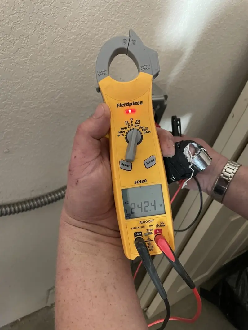 Voltage testing with clamp meter during Generator Installation in Menasha